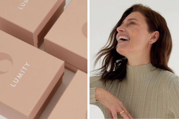 Split-frame: matte blush LUMITY boxes stacked left; smiling woman in beige ribbed sweater at right, hand near collarbone.