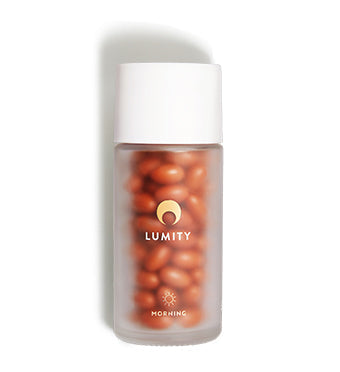 Lumity female morning supplements in frosted glass bottles 