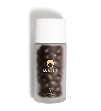 Lumity female night supplements in frosted glass bottles 