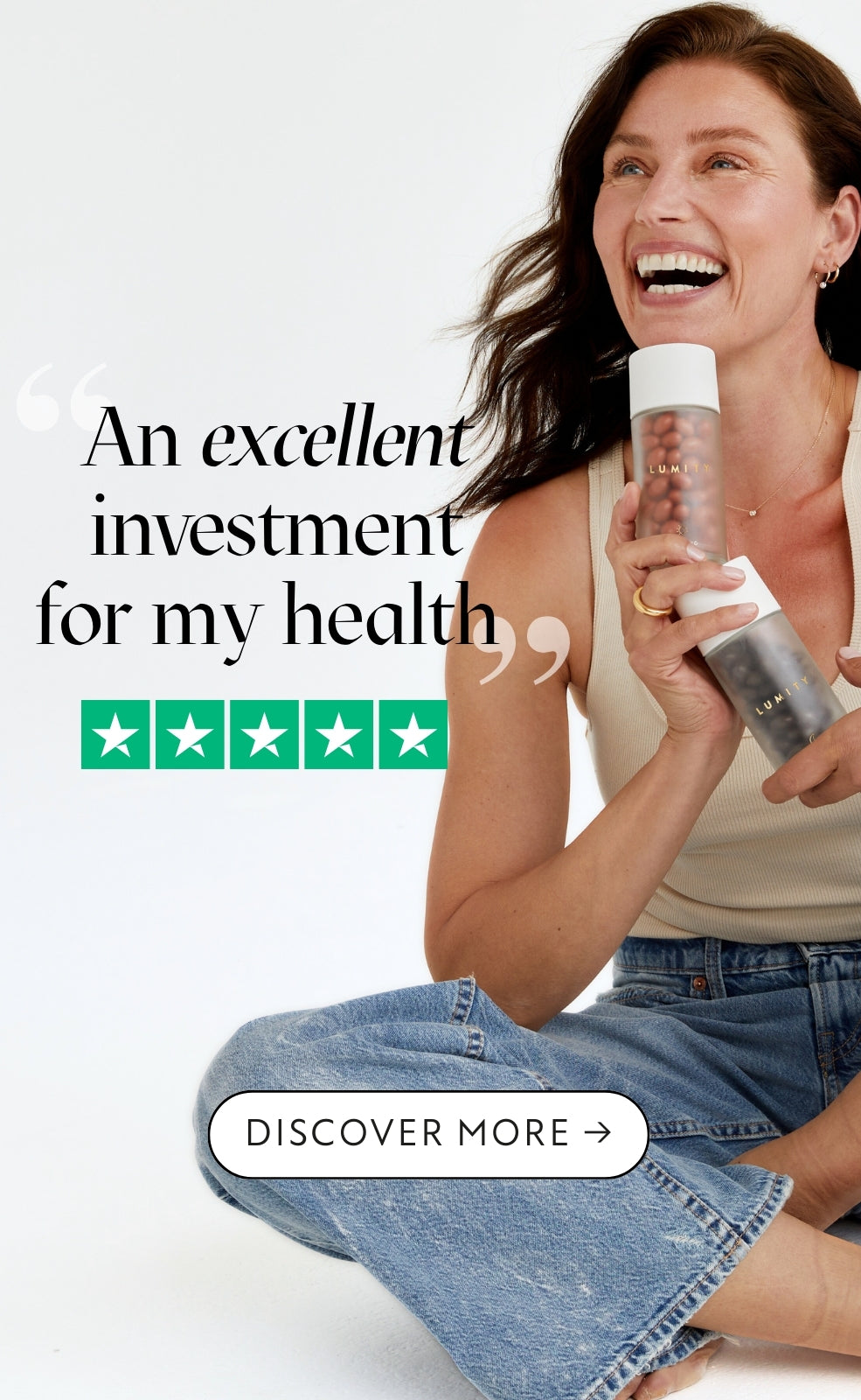 Woman holding Lumity supplement bottles with text about an excellent investment for health on a white background