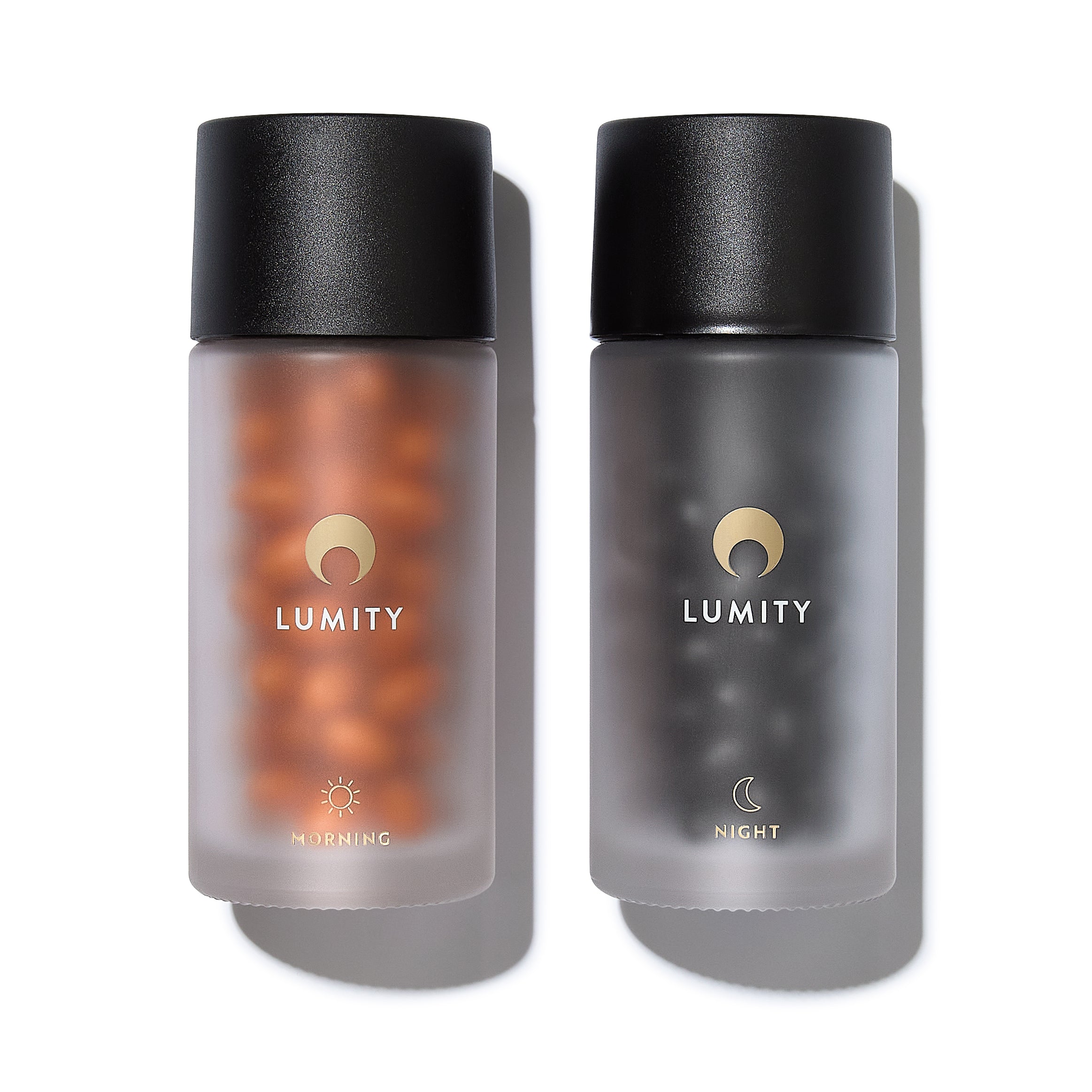 Two frosted Lumity bottles with black lids, labeled morning and night for a male wellness plan.