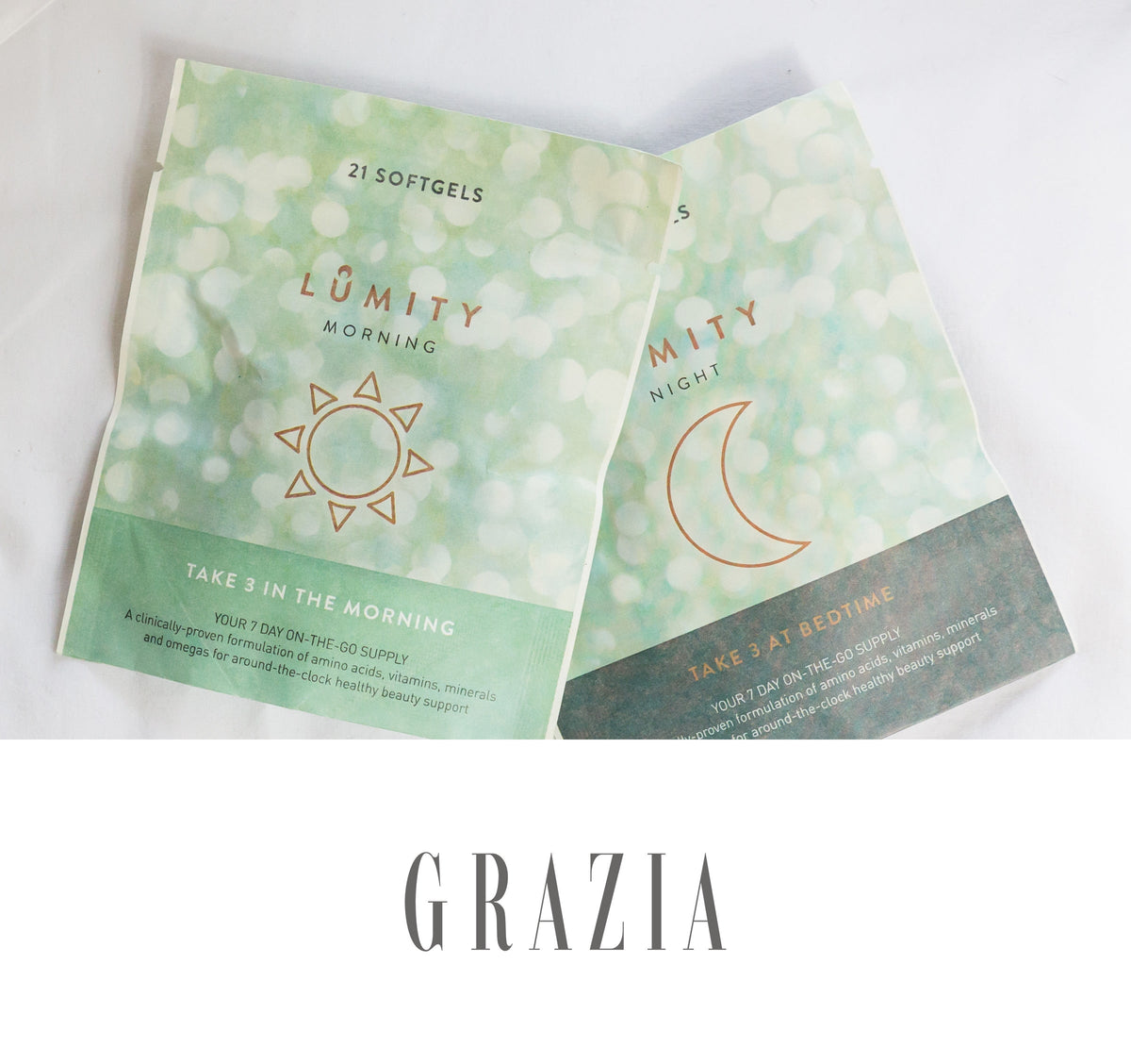Lumity Morning and Night softgel packets overlap, gold sun and moon, labeled 3 softgels and clinically proven beauty.