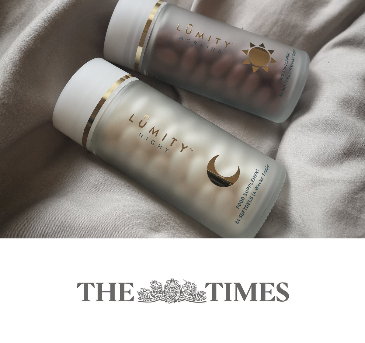 Lumity Morning and Night frosted supplement bottles with gold sun and crescent icons, angled close-up.