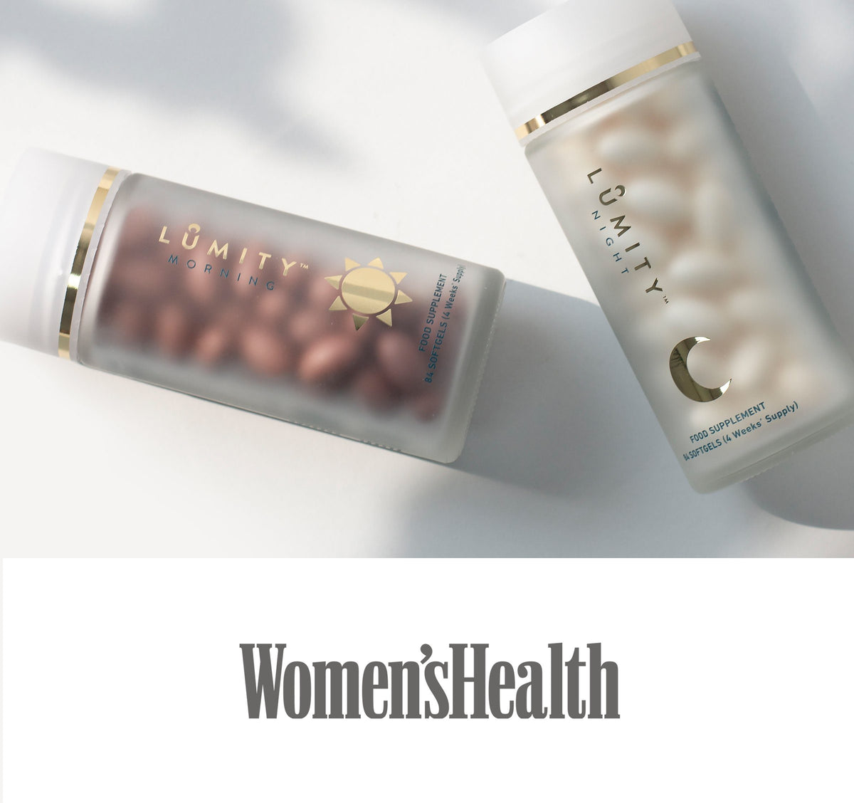 Lumity Morning and Night frosted glass supplement bottles, top-down angle, dark-brown morning and off-white night softgels