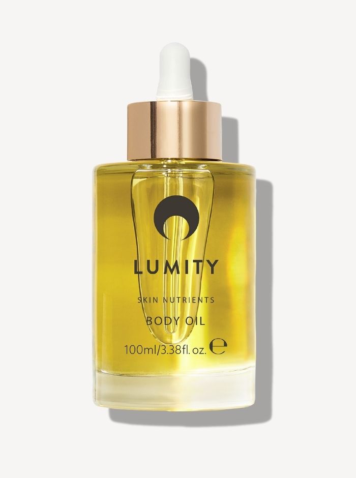 Lumity body oil bottle with dropper on a white background