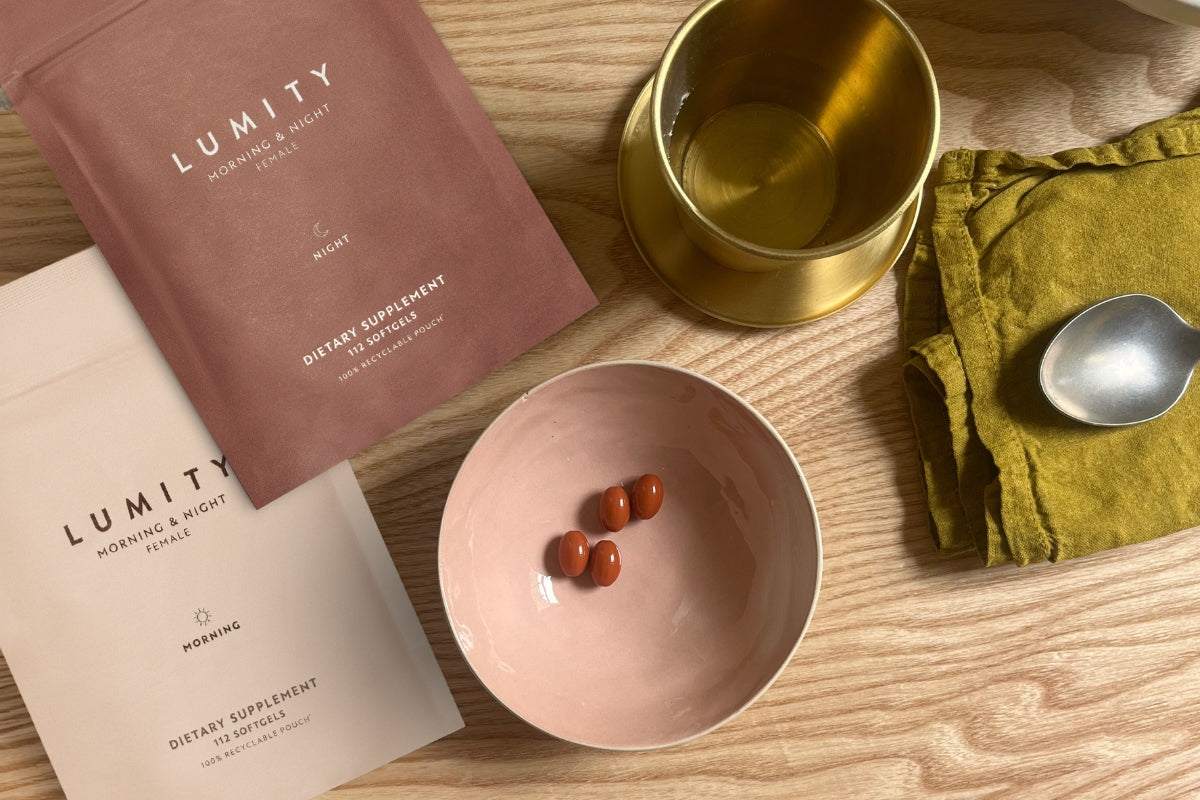 Image showing Morning & Night supplement on table with pouches, drinks and cutlery