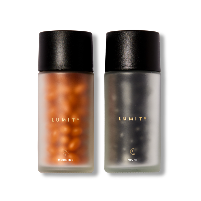 Two frosted bottles labeled morning and night supplements with black lids and blurred contents inside