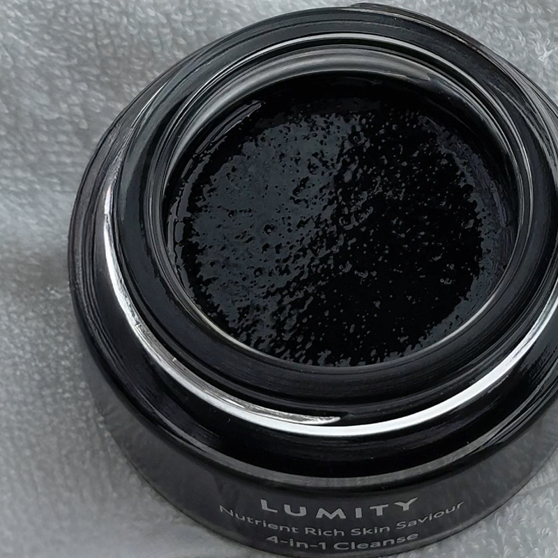 Lumity Skin Nutrients 4-in-1 Cleanse without a lid on a grey background