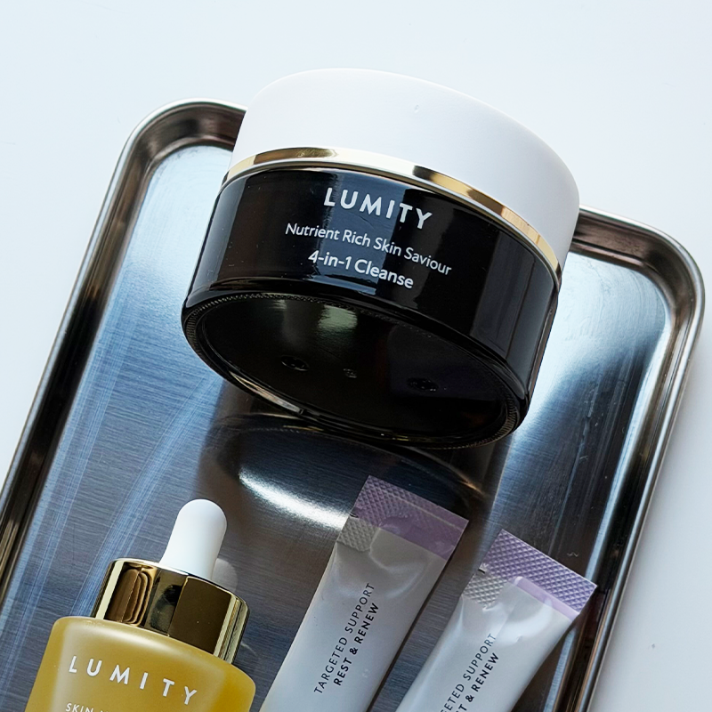 Lumity Skin Nutrients 4-in-1 Cleanse, Facial Oil and Lumity Targeted Support Rest & Renew Sachets on a tray